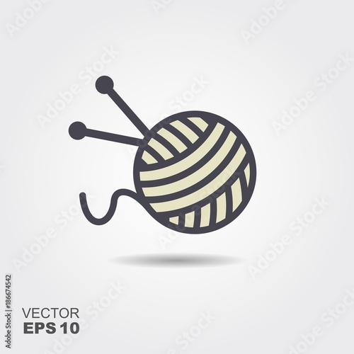 A ball of wool and knitting needles