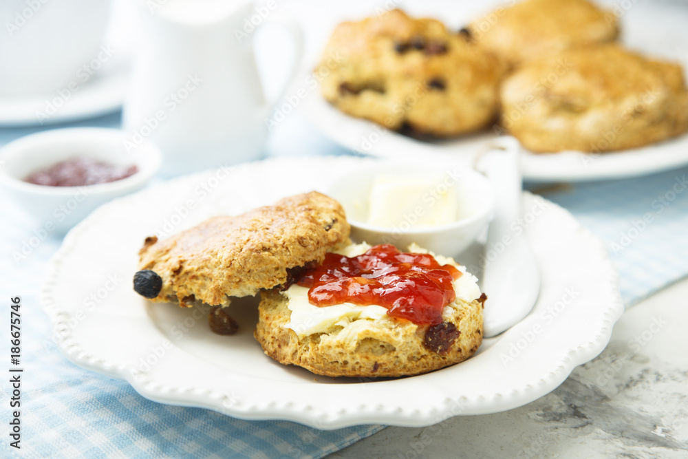 Fresh homemade scones with butter and jam Fresh homemade scones with butter and jam