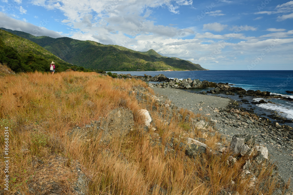 One of the roads with a most view on the Cuban coast at the foot of mountains Sierra Maestra and above the coast of the Caribbean sea