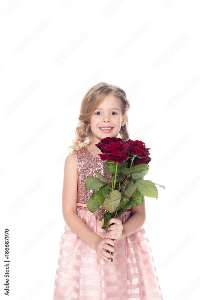 adorable child in dress holding bouquet of red roses, isolated on white adorable child in dress holding bouquet of red roses, isolated on white