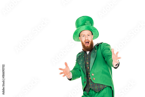 excited handsome leprechaun in green suit and hat, isolated on white