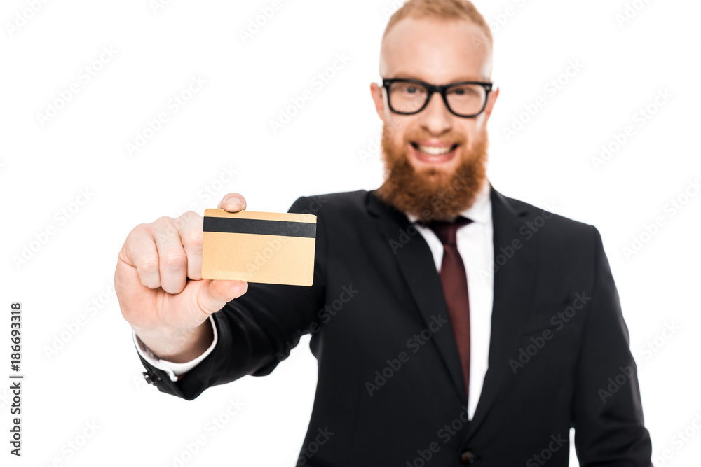 close-up view of handsome bearded businessman in eyeglasses holding credit card and smiling at camera isolated on white close-up view of handsome bearded businessman in eyeglasses holding credit card and smiling at camera isolated on white