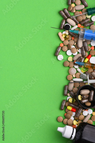 Heap of medicine tablets and pills of different colors