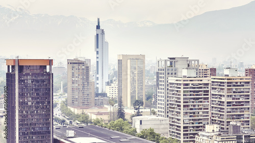 Color toned picture of Santiago de Chile downtown covered by smog.