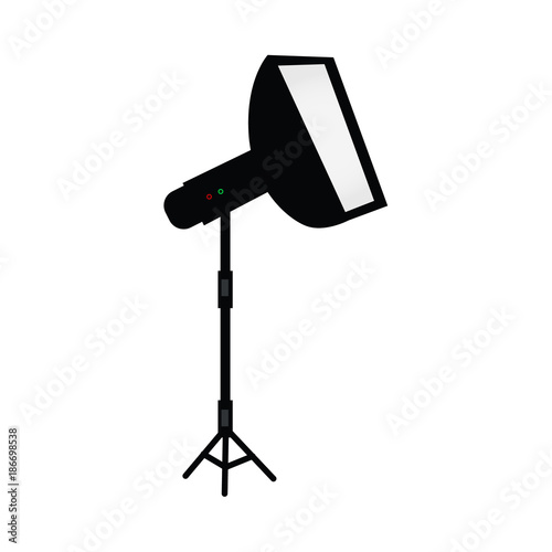 vector flat cartoon photo studio flash light with softbox standing at special tripod stand side view. Professional photo equipment. Isolated illustration on a white background.