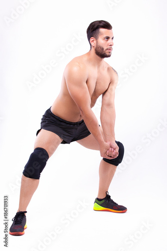 male volleyball player on light background
