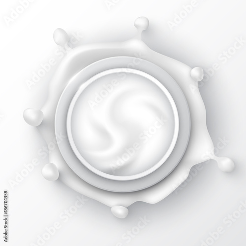 Jar of cream with splash, top view