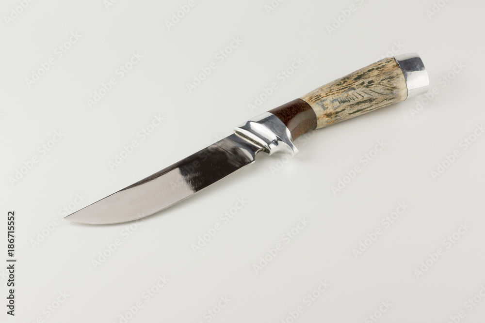 Hunting knife on white background Hunting knife on white background