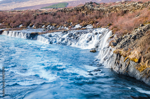 Hraunfossar waterfall, Iceland. Autumn landscape.