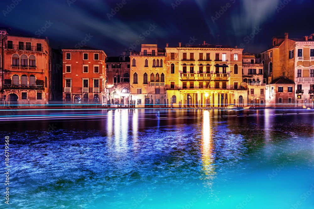 Grand canal at Venice by night with lights.