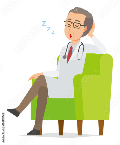 A middle-aged male doctor wearing a white coat is sitting on a sofa and being dozing off