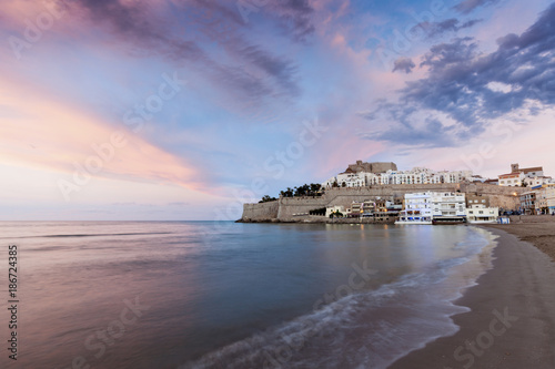 View of townscape with sea during sunset