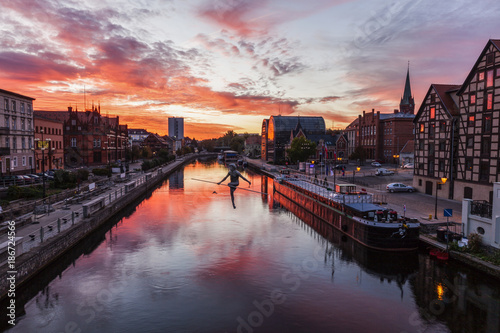 Canvas Print Poland, Kuyavian-Pomeranian, Bydgoszcz, Brda River, Dramatic sky reflecting in w