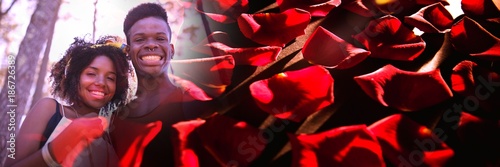 Fototapeta Naklejka Na Ścianę i Meble -  Couple with valentine's love transition rose petals