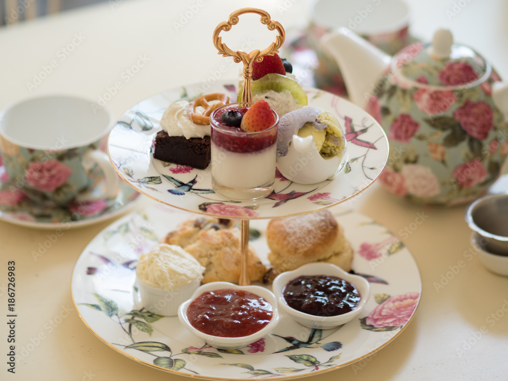 british afternoon tea scones with home made jam and icecream british afternoon tea scones with home made jam and icecream