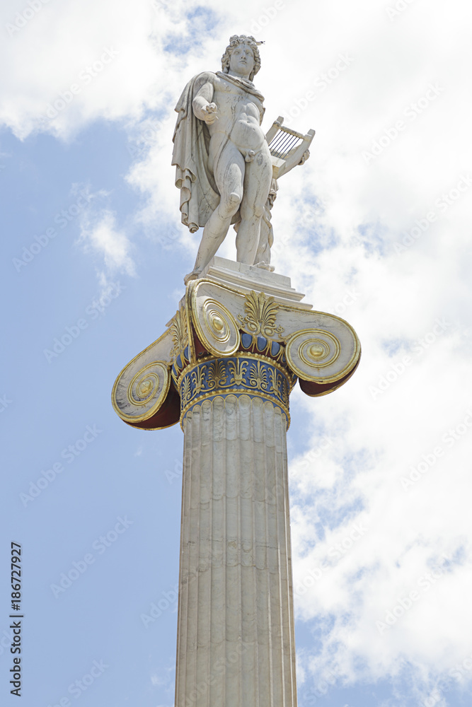 Statue of Apollo god, it is located by the main entrance of the Academy of Athens, Greece. Statue of Apollo god, it is located by the main entrance of the Academy of Athens, Greece.