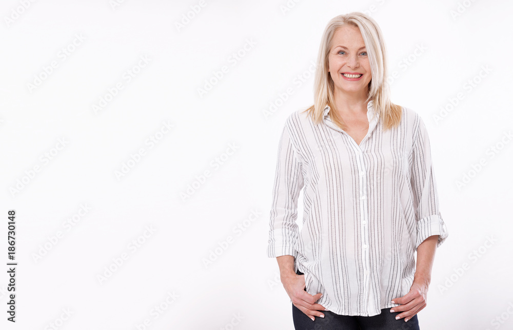 Friendly smiling middle-aged woman isolated on white background Friendly smiling middle-aged woman isolated on white background