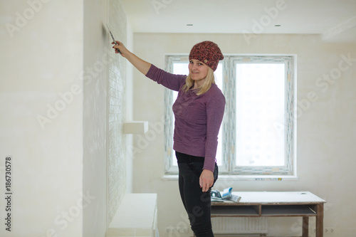 Girl girl doing repairs in room