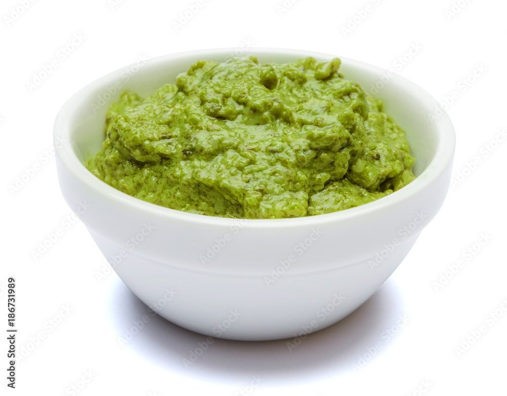 Pesto Sauce with Basil on White Background Studio shot Pesto Sauce with Basil on White Background Studio shot