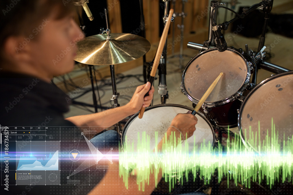 Fototapeta premium male musician playing drum kit at concert