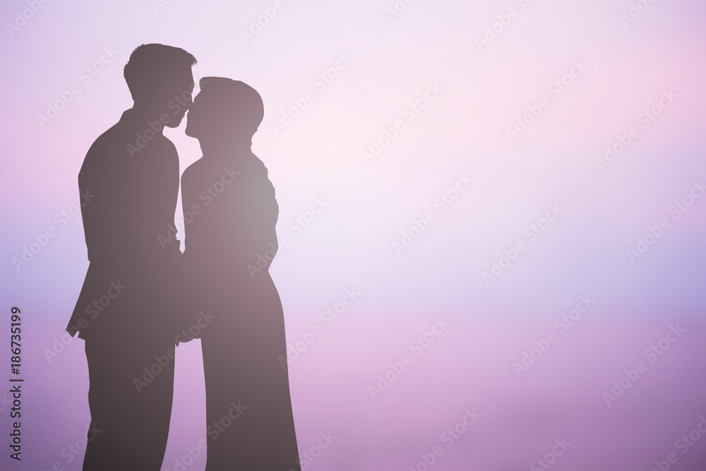 silhouette adult lover kiss and hug in wedding ceremony for valentine and married concept silhouette adult lover kiss and hug in wedding ceremony for valentine and married concept