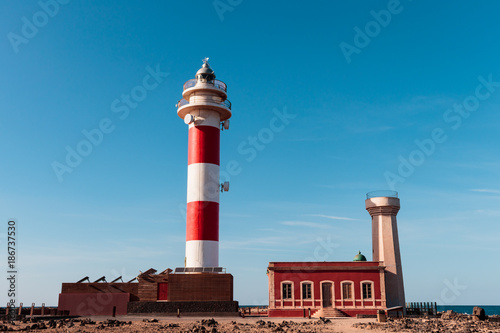 Lighthouse in the North of Fuerteventura on blue sky