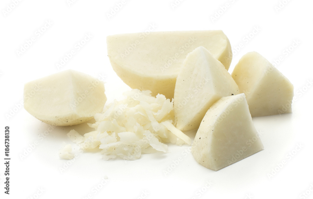 Peel black radish cut pieces and chopped stack isolated on white background. Peel black radish cut pieces and chopped stack isolated on white background.