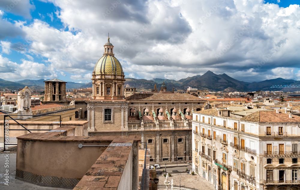View of San Giuseppe dei Teatini church with Pretoria fountain from roof of Santa Caterina church in Palermo, Sicily, Italy