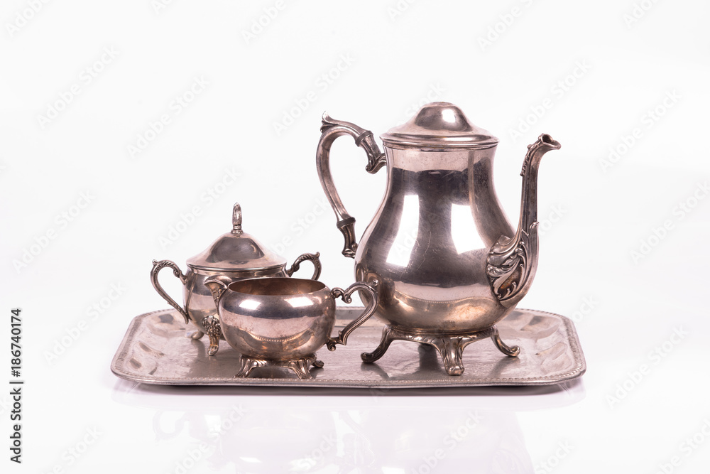 art deco silver sugar bowl and teapot on a tray