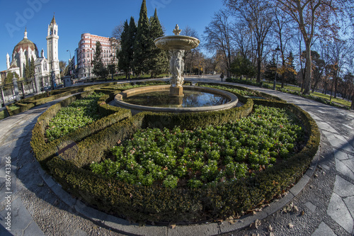 Fish-eye view 180 of a fountain in the Retiro park in Madrid city