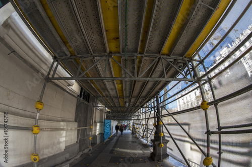 Fish-eye view 180 of a passageway for works in the streets of the city of Madrid