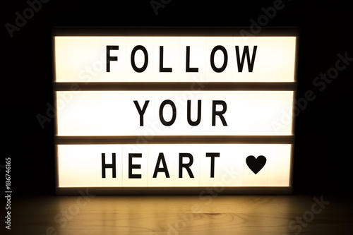 Folow your heart light box sign board photo