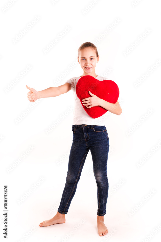 Cute little girl holding red heart isolated Cute little girl holding red heart isolated