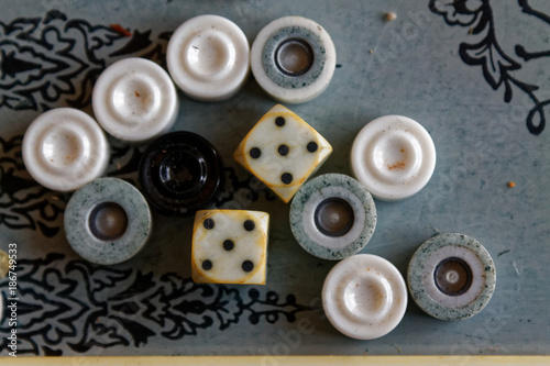 Backgammon opened, mini table game for journey, top view photo