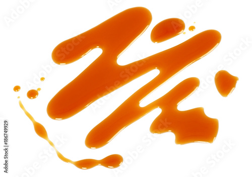 Delicious caramel sauce on a white background