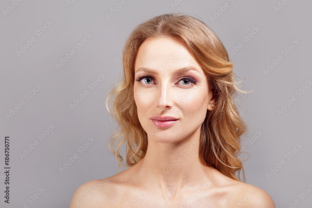 Amazing woman portrait. Beautiful girl with long wavy hair. Blonde model with hairstyle. Amazing woman portrait. Beautiful girl with long wavy hair. Blonde model with hairstyle.