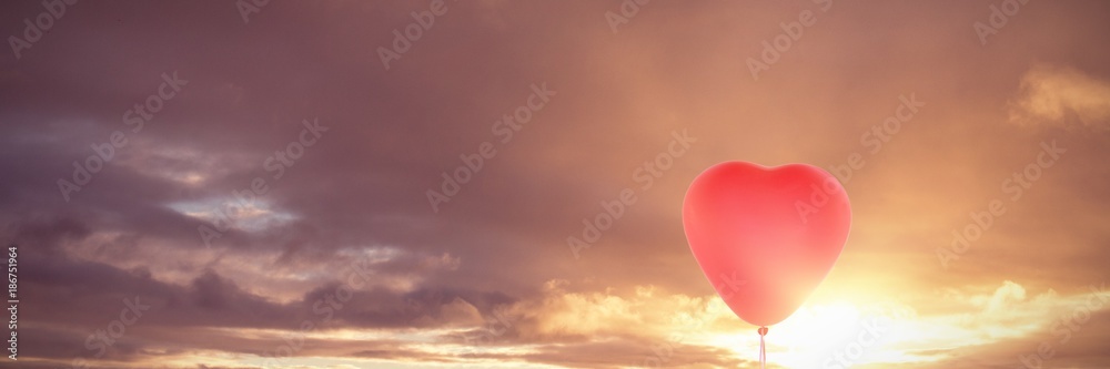 Composite image of valentines day pink heart balloon 