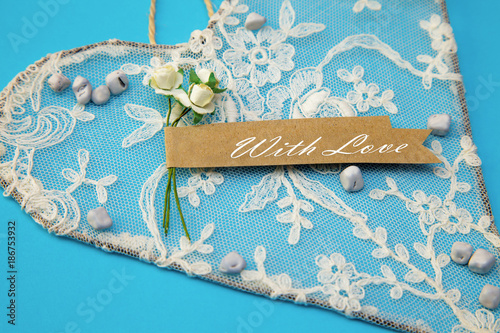 Valentine's hearts vintage blue background handmade dry branches wedding love happiness pebbles colored 14 February photo