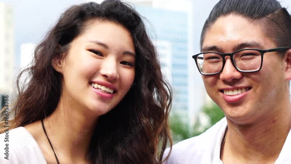 Portrait of Asian Couple Smiling Portrait of Asian Couple Smiling