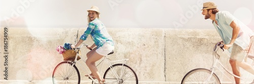 Cute couple on a bike ride photo