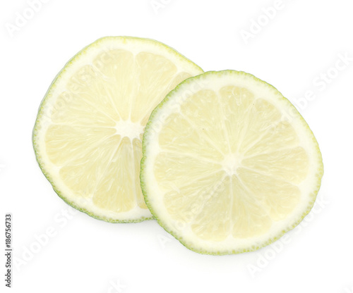 Two lime ring slices top view isolated on white background.