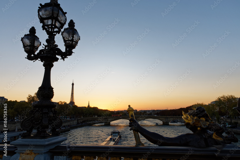 Fototapeta premium Eiffel tower viewed from Alexander III bridge in Paris, France, October 14, 2017