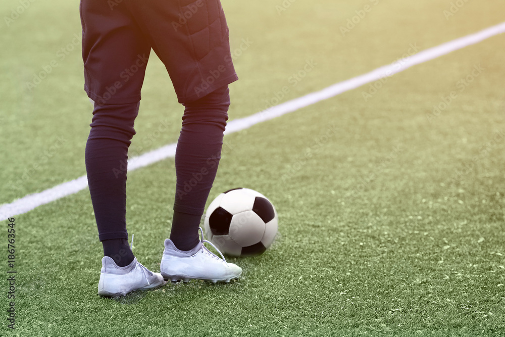 Goalkeeper football team with a soccer ball.