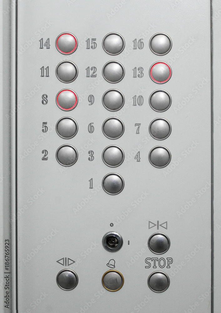 Closeup of a control panel with buttons in the lift cabin Closeup of a control panel with buttons in the lift cabin