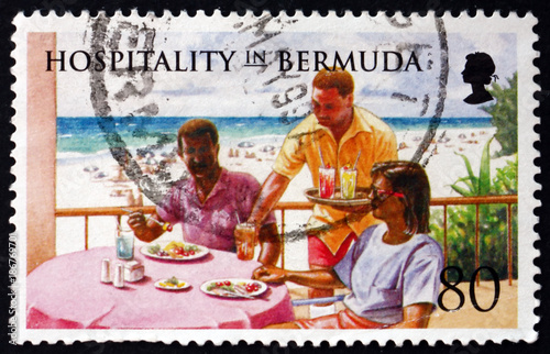 Postage stamp Bermuda 1998 waiter serving couple