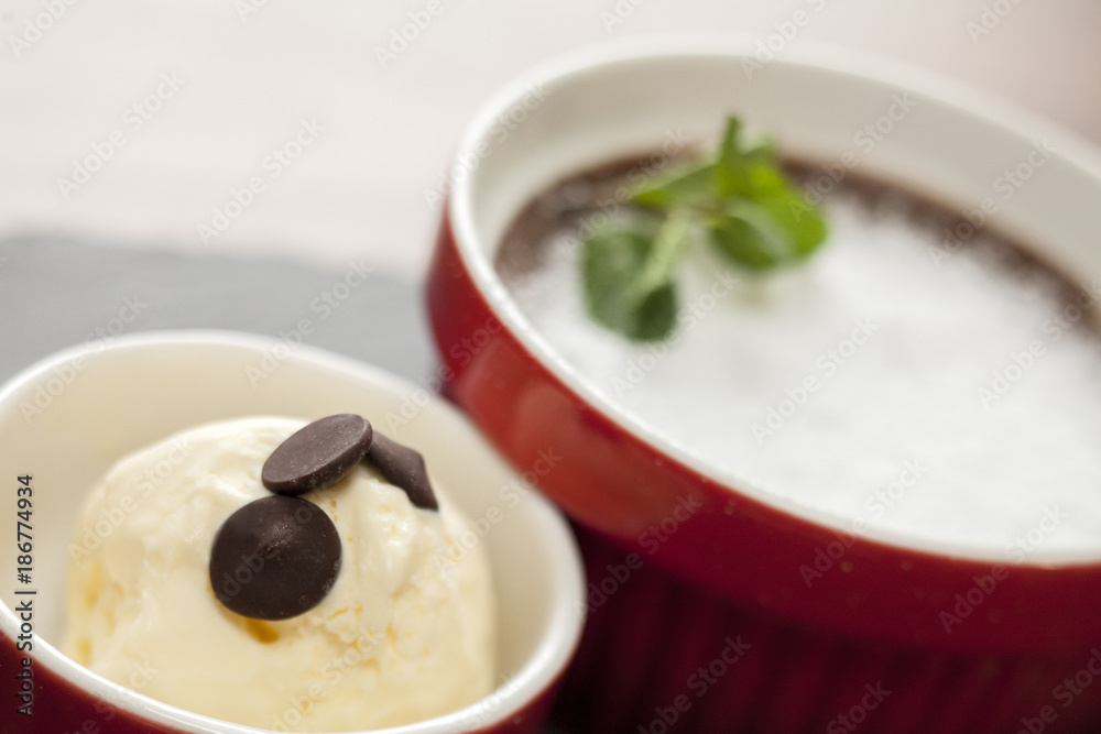 souffle served on a table in a restaurant with focus on ice cream souffle served on a table in a restaurant with focus on ice cream