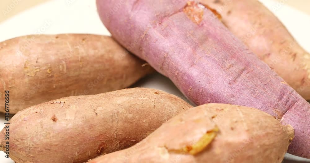 Cooked sweet potatoes in rotation Cooked sweet potatoes in rotation