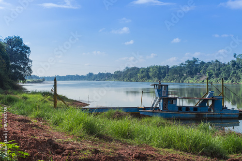 A stop boat after done new bridge with blue sky