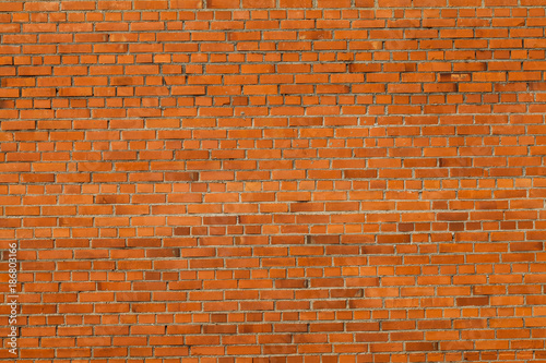 Brick wall texture background style vintage brown brick wall. Exterior urban background for your concept or project. Empty space for text and web design.