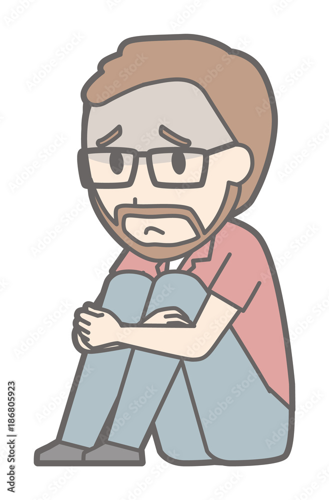 A man with eyeglasses and a beard is sitting on the floor A man with eyeglasses and a beard is sitting on the floor